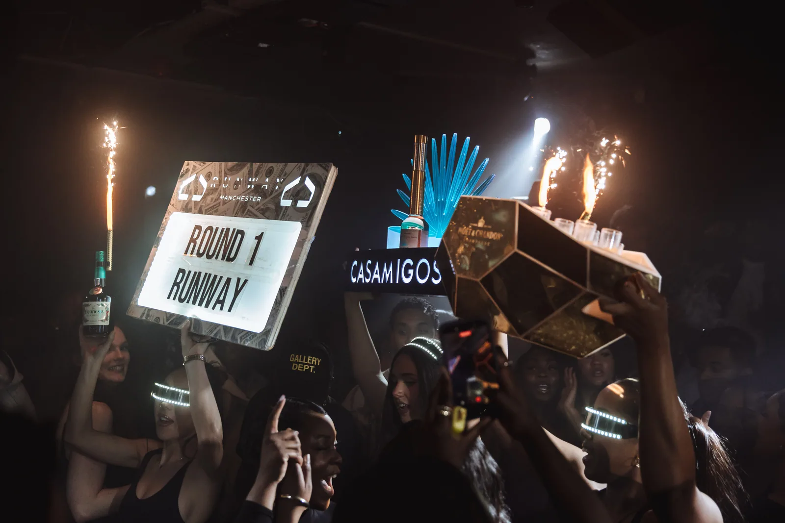 Runway bottle service with sparklers